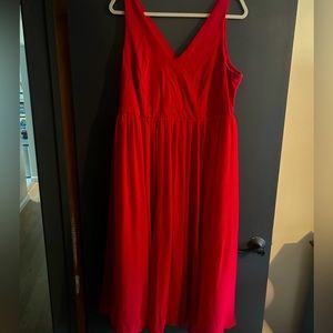 Red tea length dress. Snagged - shown in picture.